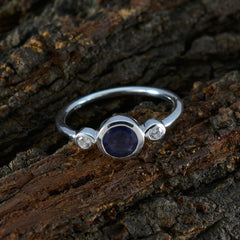 Sakura silver blue gemstone ring for women with a round center stone and two small clear side stones