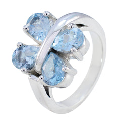 Laura silver ring with four pear cut blue stones in clover design blue gemstone statement ring