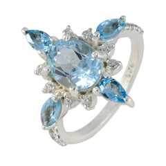 Marie blue gemstone statement ring with oval and pear-shaped blue stones on silver band