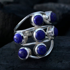 Andrea blue gemstone statement ring with seven round blue stones set in silver band