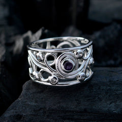 Dayana silver ring with detailed filigree design and a central blue gemstone statement ring