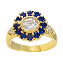 Isabella gold ring with blue gemstone statement ring design featuring central clear stone and surrounding blue gems