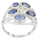 Skylar blue gemstone statement ring with multiple oval blue stones set in silver band