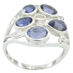 Skylar blue gemstone statement ring with multiple oval blue stones set in silver band
