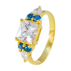 Jia gold ring featuring a blue gemstone statement ring design with clear and blue stones