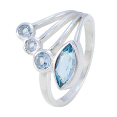 Dewi sterling silver ring with marquise center and three round side stones blue gemstone statement ring