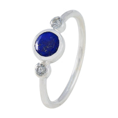 Seo yeon silver band blue gemstone trilogy ring featuring a central deep blue stone flanked by two bezel diamonds