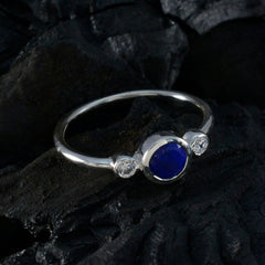 Seo yeon silver ring with central round blue stone and two side diamonds blue gemstone trilogy ring