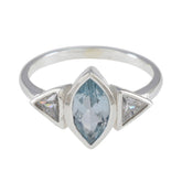 Chen blue gemstone trilogy ring with marquise center stone and two triangular side stones in silver band