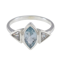 Chen blue gemstone trilogy ring with marquise center stone and two triangular side stones in silver band