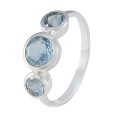 Natcha sterling silver blue gemstone trilogy ring with three bezel set light blue round stones