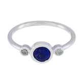 Seo yeon sterling silver blue gemstone trilogy ring with central lapis style blue stone and two clear side stones