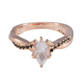 Angel rose gold ring with marquise clear gemstone and black stones band design
