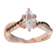 Angel rose gold ring with marquise clear center stone and black accent gemstones blue halo gemstone ring