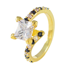 Ines gold ring with square clear center stone and black and peach accents blue halo ring for women