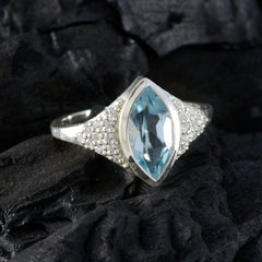 Cecilia blue halo ring for women with marquise-cut blue gemstone and silver band with small crystals