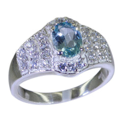 Kristine silver blue halo ring for women with oval blue gemstone and surrounding clear stones