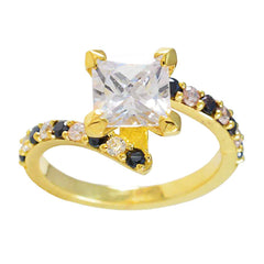 Ines blue halo ring for women with gold band and square clear center stone accented with small black and pink gems