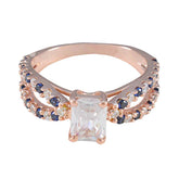 Sakura blue halo ring for women with rose gold band and rectangular center stone
