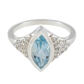 Cecilia blue halo ring for women featuring marquise blue gemstone and silver band with small accent stones
