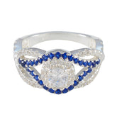 Isabella silver ring featuring a sparkling blue halo ring design with blue and white gemstones