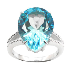 Paula blue solitaire gemstone ring with pear-shaped blue stone and silver band
