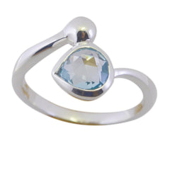 Rina blue solitaire gemstone ring with pear-shaped light blue stone set in a silver band