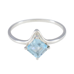 Yan delicate silver band blue solitaire gemstone ring with square light blue stone set diagonally