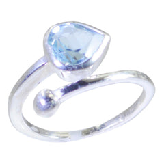 Rina elegant blue solitaire gemstone ring with a pear-shaped blue stone set in silver band
