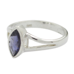 Angel blue solitaire geometric ring with marquise cut blue stone and silver band