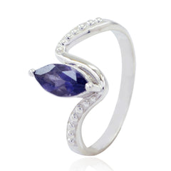 Meera elegant blue solitaire ring with marquise cut blue gemstone and silver band detailing