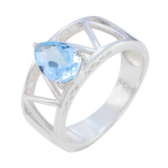 Putri blue solitaire ring for women with pear shaped blue gemstone and silver openwork band