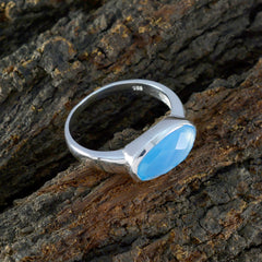 Wen sterling silver ring with faceted oval blue gemstone bezel set on bark background blue solitaire ring for women