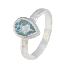 Riya blue solitaire ring for women with pear-shaped blue gemstone and silver band