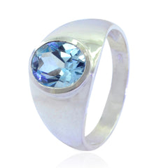 Aria blue solitaire ring for women with oval blue gemstone set in polished silver band