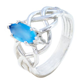 Carla blue solitaire ring for women with an intricate silver band and marquise-cut blue gemstone