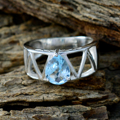 Putri blue solitaire ring for women featuring a pear-shaped blue gemstone set in silver band