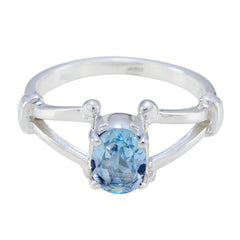 Bella blue solitaire ring for women with oval blue gemstone set in silver band