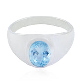 Aria blue solitaire ring for women with an oval blue gemstone set in a sleek silver band