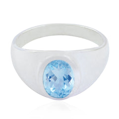 Aria blue solitaire ring for women with an oval blue gemstone set in a sleek silver band