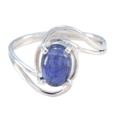 Yuki blue solitaire ring for women with oval blue cabochon gemstone set in polished silver twist band