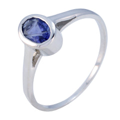 Mei blue solitaire ring for women with a round blue gemstone set in a sleek silver band