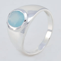 Ananya blue solitaire ring for women with a smooth silver band and round blue gemstone