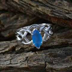Carla blue solitaire ring for women with marquise cut blue gemstone and intricate silver band design