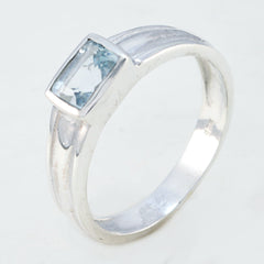 Naomi Blue Solitaire Ring Elegant Silver Band