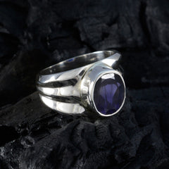 Genesis blue solitaire ring silver with an oval blue gemstone set in polished silver band
