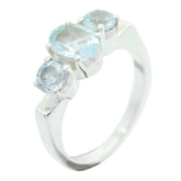 Kristine silver blue solitaire ring with three light blue gemstones in a row