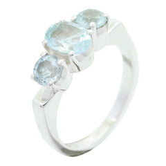 Kristine silver blue solitaire ring with three light blue gemstones in a row