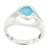 Layla silver ring featuring a blue solitaire wedding ring with a modern open design