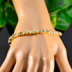 Katarina Blue Tennis Bracelet in Gold Tone